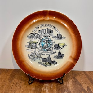 Vintage 1964-65 New York World’s Fair Ashtray – Brown Border – Unisphere Souvenir – 7.5&quot; Ceramic Dish
