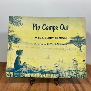 Pip Camps Out – 1966 First Edition Hardcover – Myra Berry Brown – Illustrated by Phyllis Graham