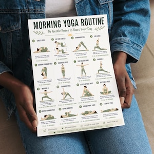 May include: A white poster detailing a morning yoga routine, featuring the text "MORNING YOGA ROUTINE" and "16 Gentle Poses to Start Your Day". The poster shows yoga poses with instructions. The poster is held by a person wearing a denim jacket.