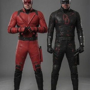 May include: Two figures in superhero costumes. One is in a red suit with a matching mask and batons. The other is in a black suit with a red "B" emblem and batons. Both are wearing boots and gloves.