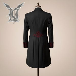 Elegant men’s black Victorian gothic tailcoat suit with red embroidered detailing, steampunk inspired long coat, formal vampire cosplay outfit, baroque style wedding attire