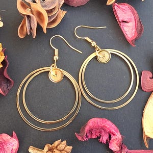 May include: A white ceramic mug with a black handle and the text "But First, Coffee" in a handwritten style. The mug is on a white surface. Suitable for hot drinks.