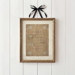 May include: A handmade wooden serving tray with a natural finish. The rectangular tray has raised edges and two handles. The visible wood grain adds to its rustic charm. Dimensions: 45.7 cm long, 30.5 cm wide, and 5.1 cm high.