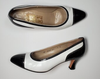 women's navy and white spectator pumps