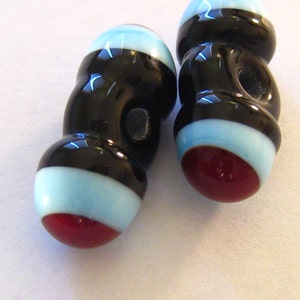 Set of 2 Red & Sky Blue on Black Barbell glass beads- unique handmade lampwork