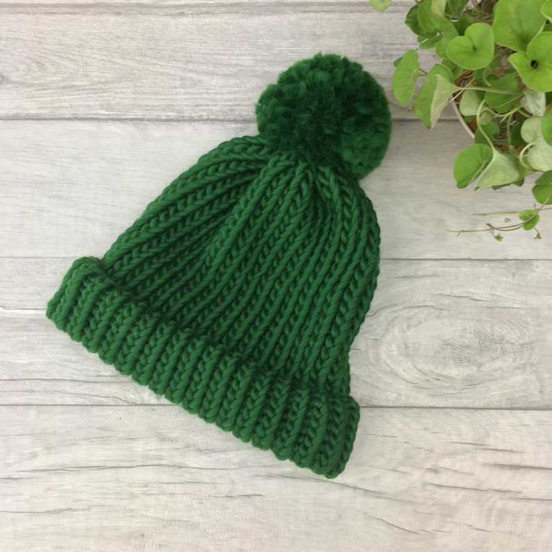 green bobble hat