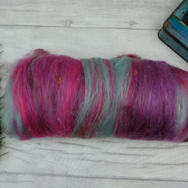 Merinowolle zum Spinnen in lila pink teal und weinrot mit Seide - Handspinnerei