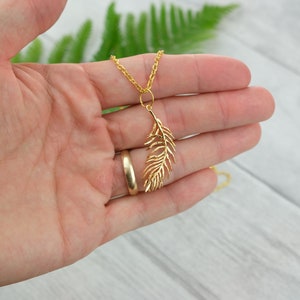Gold feather necklace - gold layering necklace - feather pendant - boho jewelry - bridesmaid gift - mommy necklace