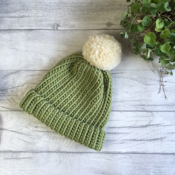 green bobble hat