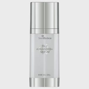 May include: A cylindrical SkinMedica TNS ADVANCED+ SERUM bottle with a metallic silver cap and base. The white label features the brand name, product name, and the text NET WT. 1.0 Oz. / 28.4 g printed in a clear, dark font on the front surface.