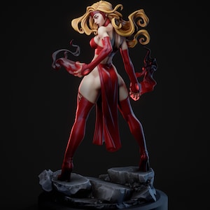 May include: A detailed figurine of a character in a dynamic pose, clad in a vibrant red outfit. The figure has long, flowing blonde hair and is standing on a rocky base. The overall aesthetic suggests a fantasy or comic book theme.