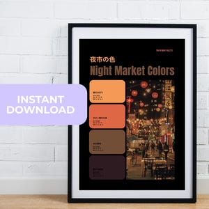May include: A framed art print featuring a black background with the text "Night Market Colors" and Japanese characters. The print includes a color palette of orange, brown, and purple hues, and a photograph of a night market scene.