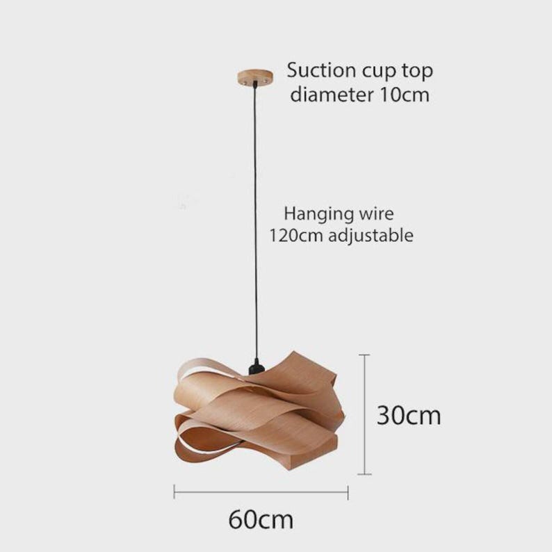 May include: A wooden pendant light with a unique, layered design. The light fixture is 30cm tall and 60cm wide, with a 10cm diameter suction cup top and a 120cm adjustable hanging wire. The light has a natural wood finish.