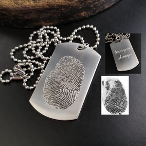 May include: Silver dog tag necklace with a fingerprint engraved on the front and the words "love you always" engraved on the back.
