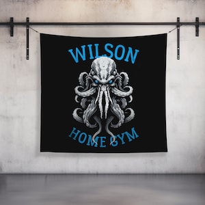 May include: Black tapestry featuring a white octopus with blue eyes and the text "Wilson Home Gym" in blue.