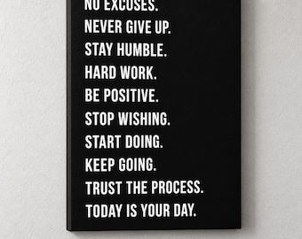 May include: A rectangular black canvas wall art piece featuring white sans-serif text that reads: NO EXCUSES. NEVER GIVE UP. STAY HUMBLE. HARD WORK. BE POSITIVE. STOP WISHING. START DOING. KEEP GOING. TRUST THE PROCESS. TODAY IS YOUR DAY.