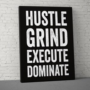 May include: Black and white motivational poster with the text "Hustle Grind Execute Dominate" in a distressed font.