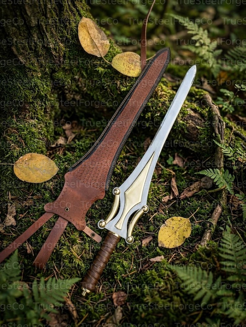 May include: A double-edged dagger with a polished steel blade, a brass-colored crossguard, and a brown leather-wrapped handle. The dagger is accompanied by a matching brown leather sheath featuring decorative stitching and leather straps.
