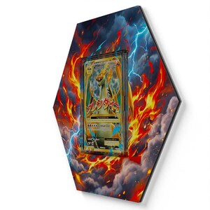 May include: A hexagonal wall display featuring a M Charizard EX trading card encased in a clear protective holder. The background panel displays a vibrant graphic of orange flames, dark storm clouds, and bright blue lightning bolts surrounding the card.