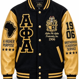 May include: A black varsity jacket with gold leather sleeves, featuring the Greek letters Alpha Phi Alpha, a crest, and the text A Higher Purpose, 1906, Brotherhood, Leadership, Service. The jacket has gold snap buttons and striped ribbed trim.