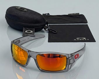 New* Oakley Gascan Sunglasses 009014 - Smokey Transparent Frame Polarized Mirrored Orange Lens