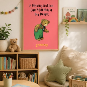 May include: A framed print with a pink background features a drawing of a teddy bear wearing green overalls. The text reads "A Missing Button Can Still Hold a Big Heart" and "Corduroy". The room includes a bookshelf, books, and a star-shaped pillow.