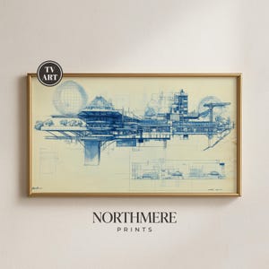 May include: Architectural blueprint art print in a gold frame. The blueprint features a complex, futuristic building design in shades of blue against a cream background. The print is labeled "TV ART" and "NORTHMERE PRINTS".
