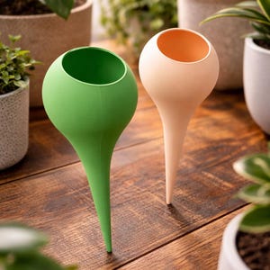 May include: A set of three ceramic mugs with a speckled, matte finish. The mugs are in shades of cream, light gray, and dark gray. Each mug has a simple, minimalist design, perfect for coffee or tea.