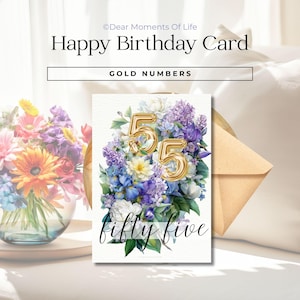 May include: A birthday card with the text "Happy Birthday Card" and "Gold Numbers". The card features a floral arrangement with gold number balloons that read "55" and the words "fifty five". An envelope is on the right.