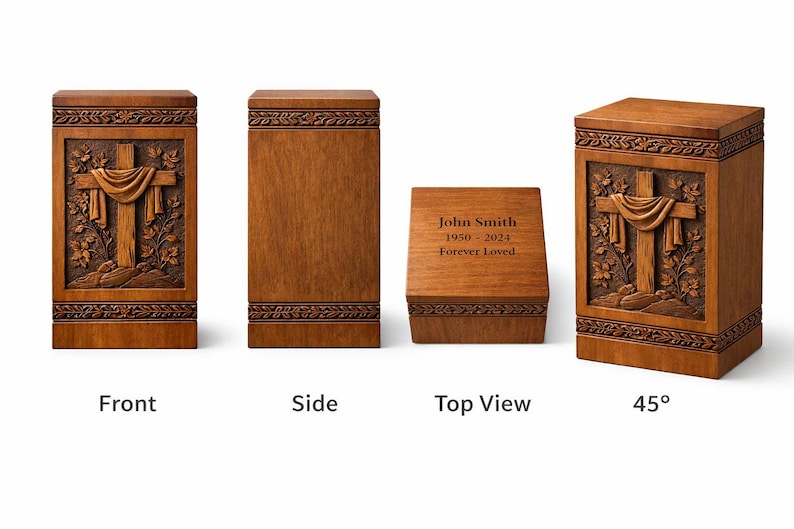 May include: Wooden urns with a carved cross design. The front view shows a detailed cross with draped fabric and floral accents. The side view is plain. The top view has engraved text. The 45-degree view shows the cross design.
