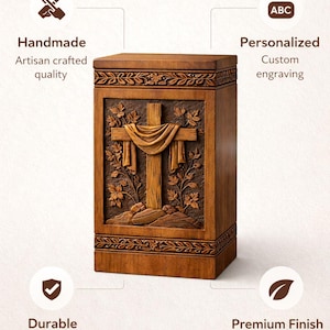 May include: A wooden urn with a carved cross design. The urn is rectangular with a detailed floral border and a cross draped with fabric. The image includes the text "Handmade", "Personalized", "Durable", and "Premium Finish".