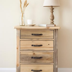 May include: A set of three ceramic mugs with a speckled, matte finish. The mugs are in shades of cream, light brown, and dark brown. Each mug has a simple, minimalist design, perfect for coffee or tea.