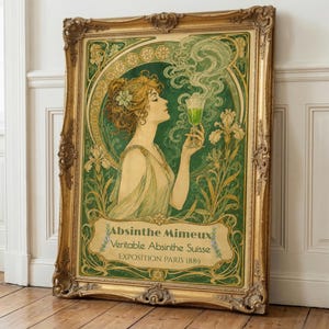 May include: A framed art print featuring a woman holding a green glass of absinthe, surrounded by green floral motifs and swirling smoke. The text reads Absinthe Mimeux, Veritable Absinthe Suisse, and EXPOSITION PARIS 1889 in a gold ornate frame.