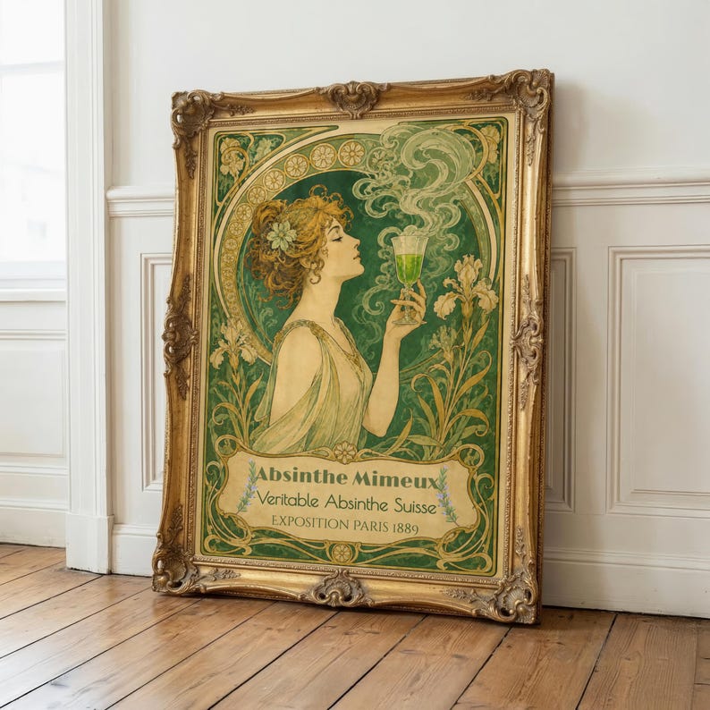 May include: A framed art print featuring a woman holding a green glass of absinthe, surrounded by green floral motifs and swirling smoke. The text reads Absinthe Mimeux, Veritable Absinthe Suisse, and EXPOSITION PARIS 1889 in a gold ornate frame.