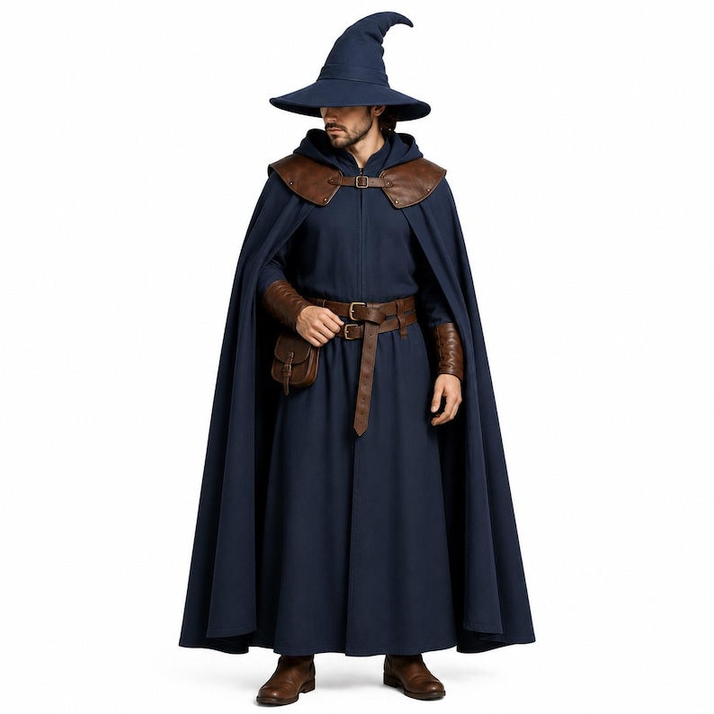 May include: A dark blue hooded cloak and matching pointed hat, featuring brown leather-like shoulder pauldrons, a brown belt with a small attached pouch, and brown wrist gauntlets. The ensemble includes a long, dark blue robe with a front zipper.