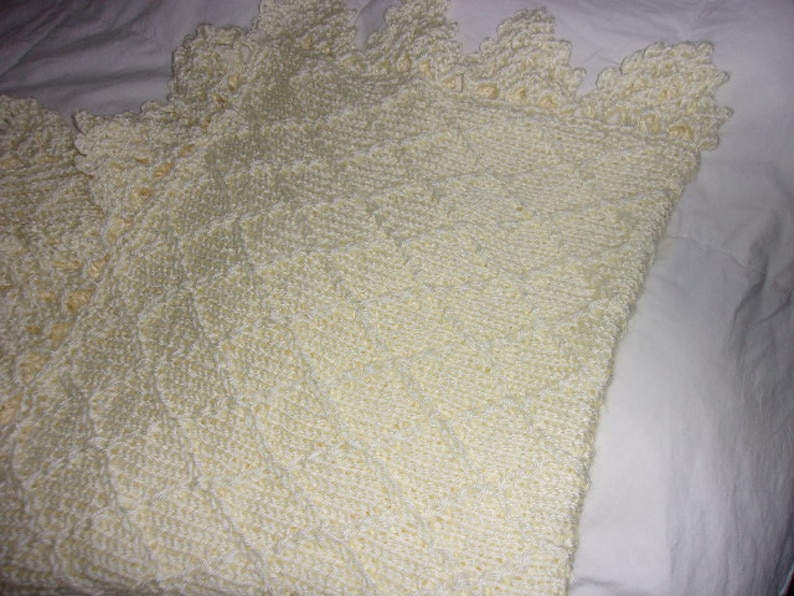 many colors Hand knit baby blanket in diamond pattern with crocheted border made to order
