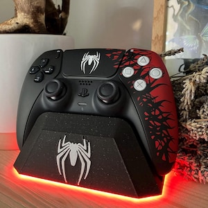 May include: A set of three ceramic mugs with a speckled, matte finish. The mugs are in shades of cream, light grey, and dark grey. Each mug has a simple, minimalist design, perfect for coffee or tea.