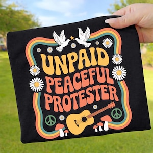 May include: A set of three ceramic mugs with a speckled, matte finish. The mugs are in shades of cream, light gray, and dark gray. Each mug has a simple, minimalist design, perfect for coffee or tea.