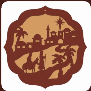 May include: A brown wooden ornament depicting a scene from the nativity story. Two figures walk towards a town with a star in the sky. Palm trees and buildings are visible in the background.