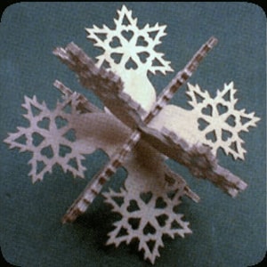 May include: A wooden snowflake ornament with intricate cutouts, featuring a 3D design with multiple layers.