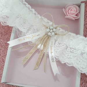 GOLD personalised wedding garter with pearl centre, gold shimmer bridal garter with name and date, garter with gift box