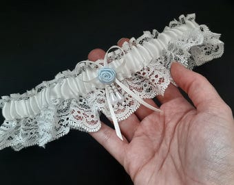 Ivory Lace Bridal Garter: Traditional Wedding Keepsake with Blue Rose