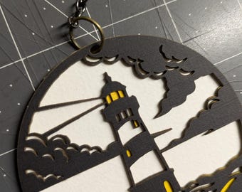 Lighthouse By The Sea: Paper Cut Ornament with chain