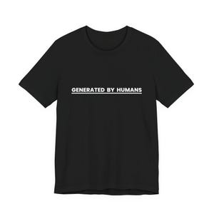 May include: Black t-shirt with the text "GENERATED BY HUMANS" in white, centered horizontally. The text is above a white underline. The shirt has short sleeves and a crew neck.
