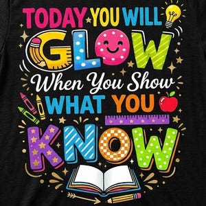 May include: Black t-shirt with a colorful graphic design. The design includes the text "TODAY YOU WILL GLOW When You Show WHAT YOU KNOW" with illustrations of a lightbulb, apple, pencil, crayons, and an open book.