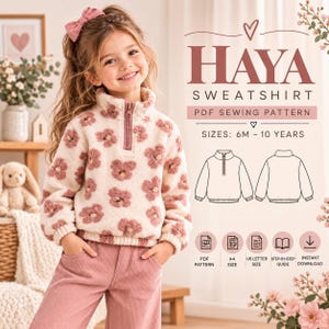 Könnte beinhalten: Ein cremefarbenes Fleece-Sweatshirt mit rosa Blumenmuster, Viertelreißverschluss und langen Ärmeln. Der Text lautet HAYA SWEATSHIRT PDF SEWING PATTERN SIZES: 6M - 10 YEARS, inklusive Strichzeichnungen der Vorder- und Rückseite des Kleidungsstücks.