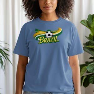 Blue t-shirt with Brazil soccer ball and flag graphic.