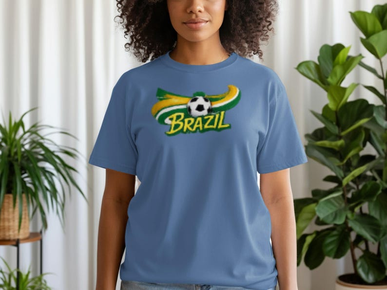 Blue t-shirt with Brazil soccer ball and flag graphic.