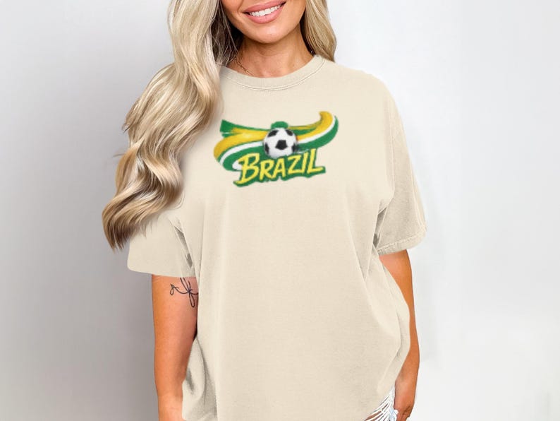 Cream t-shirt with "BRAZIL" text and a soccer ball graphic.