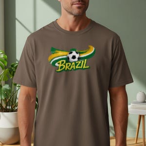 Man wearing a brown t-shirt with a "Brazil" soccer graphic.